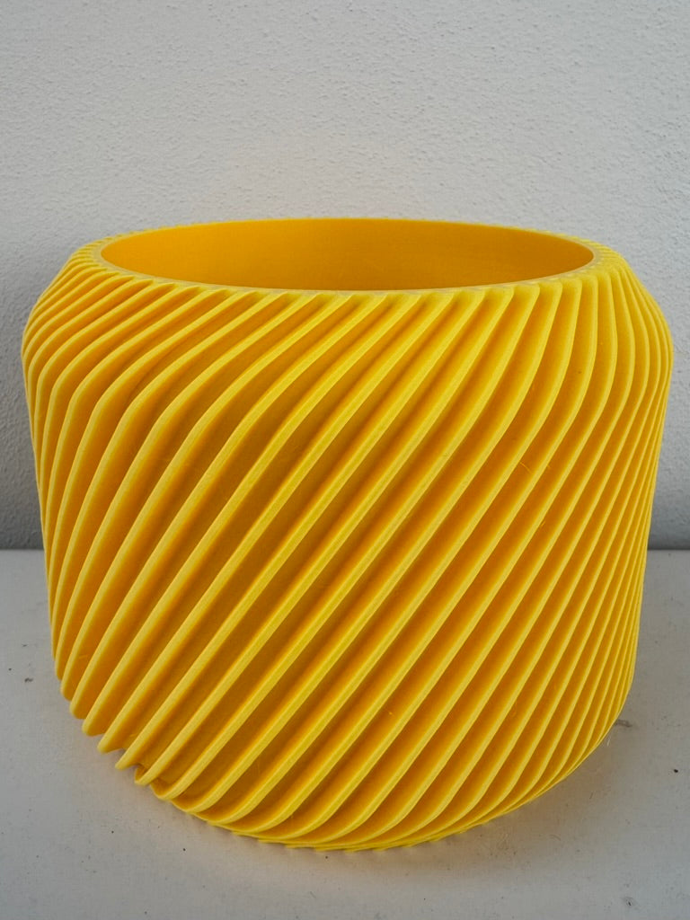 Vaso cilindrico con decorazione esterna a coste